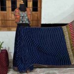 stunning navy blue ajrakh mirror work saree full view with multi-color prints